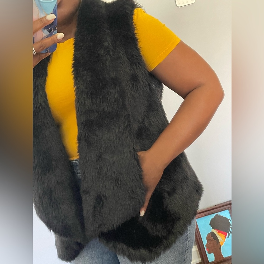 Kiss & Tell Black faux fur vest.